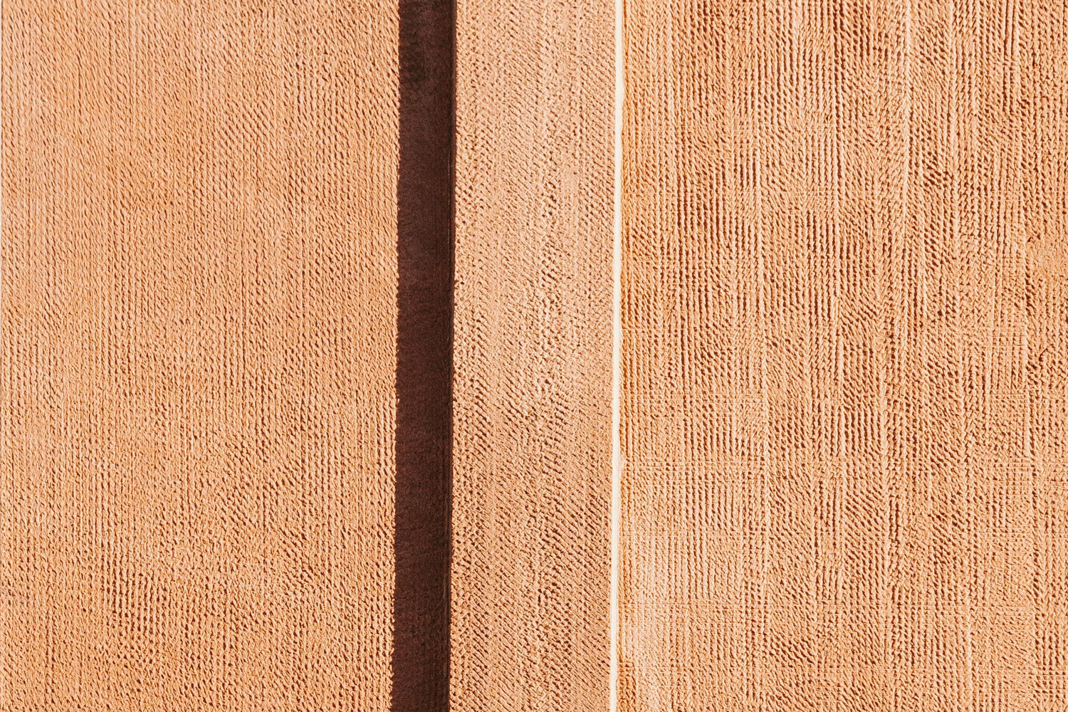Close-up of a textured premium beech hardwood surface used in the construction of Islamic Lamps by Andaluces and Andalusian, Moorish, Arabesque, Hardwood Islamic Pattern Lamp glowing with warm white LED Bulb light. Islamic Lamp, Islamic Lamps, Wooden.